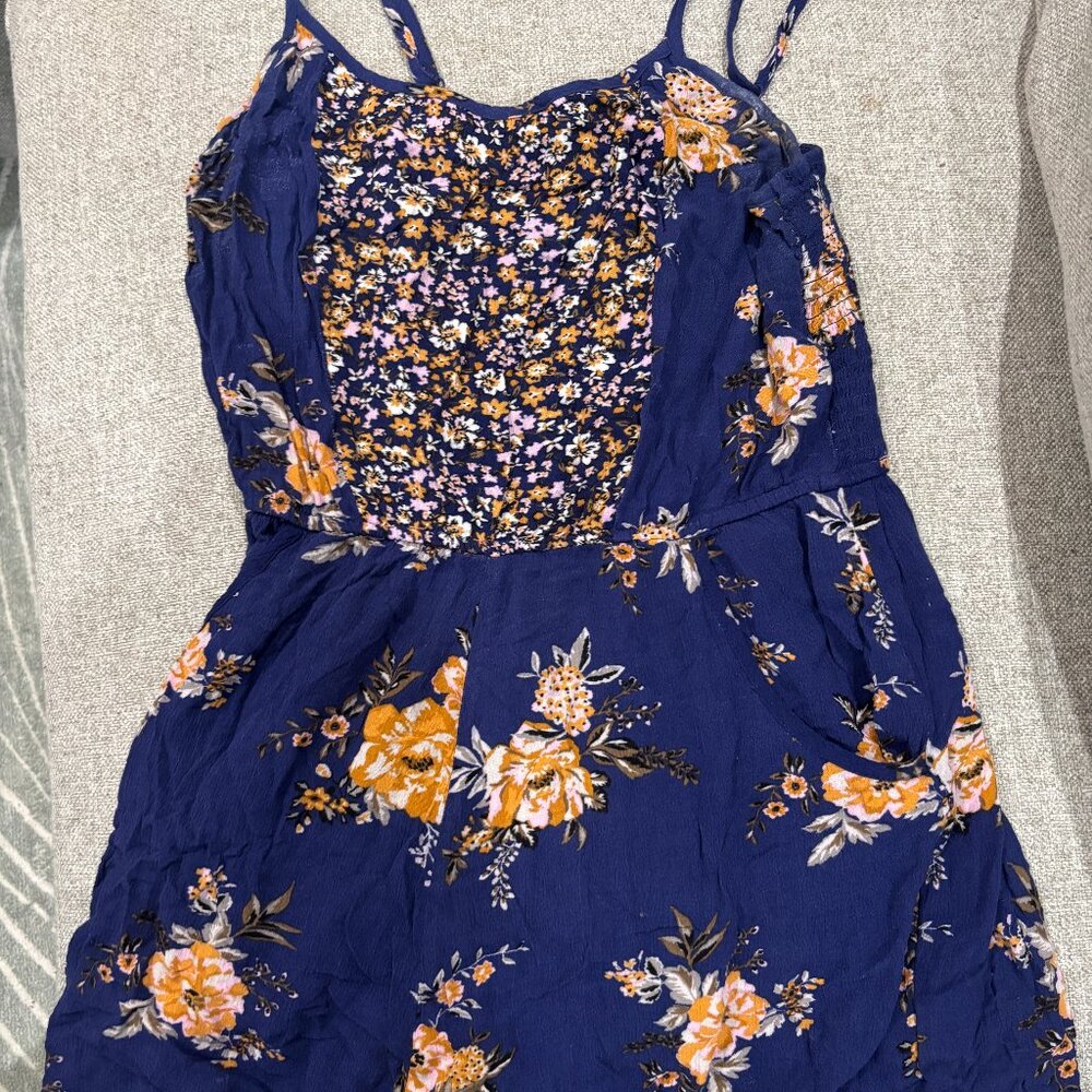 Blue floral romper/jumpsuit
